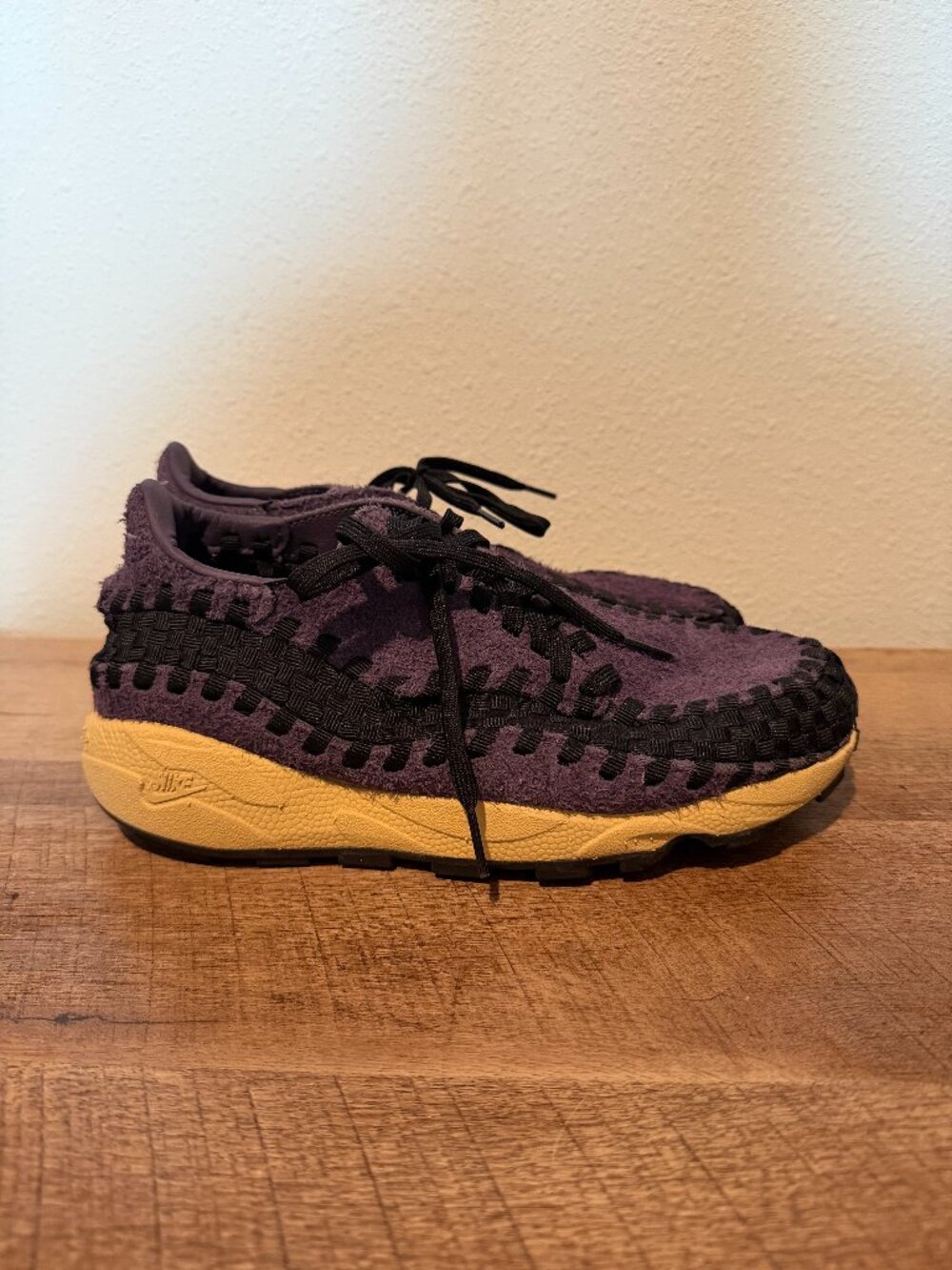 Nike Women's Air Footscape Woven sneakers in the Dark Raisin colorway